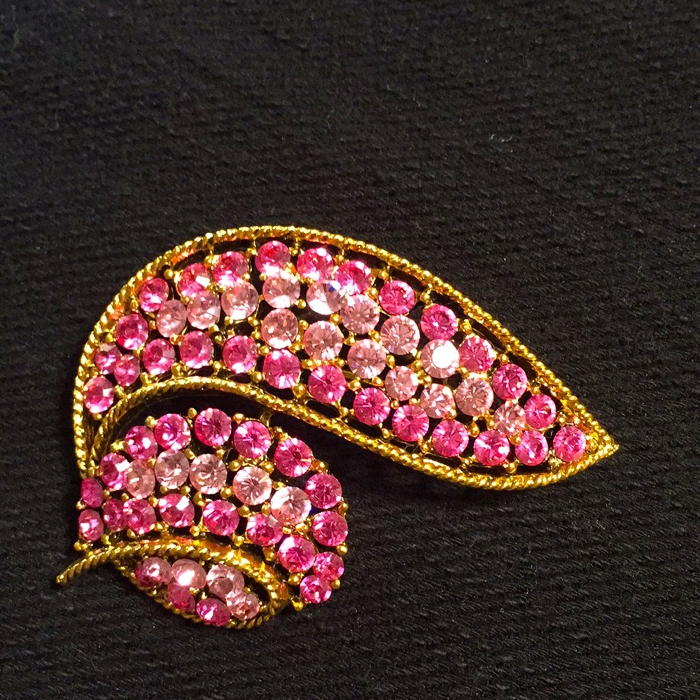 Light and darker pink stones. Like brand new.